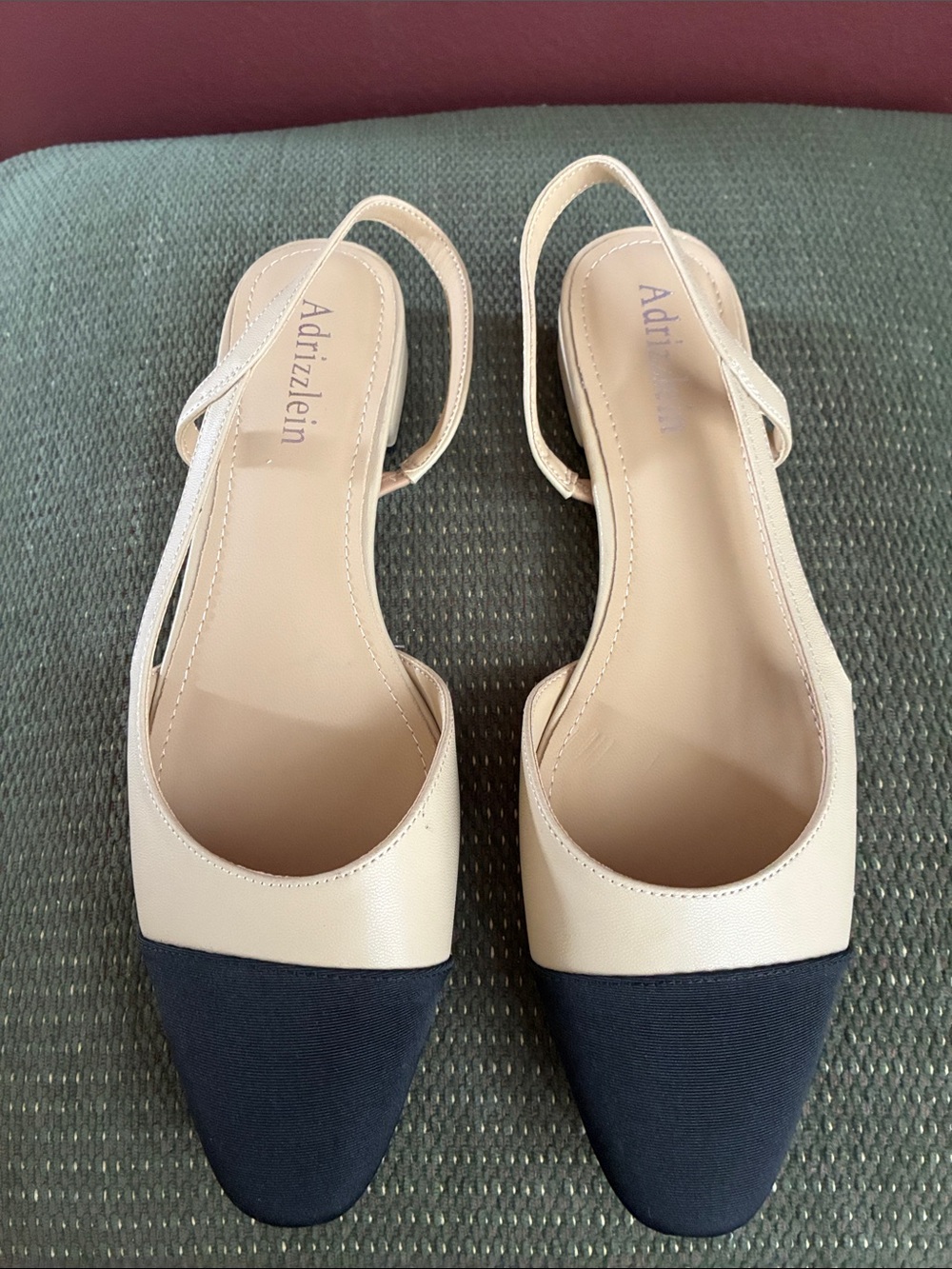 Adrizzlein Two-Tone Pointed Slingback Flats in Beige and Black